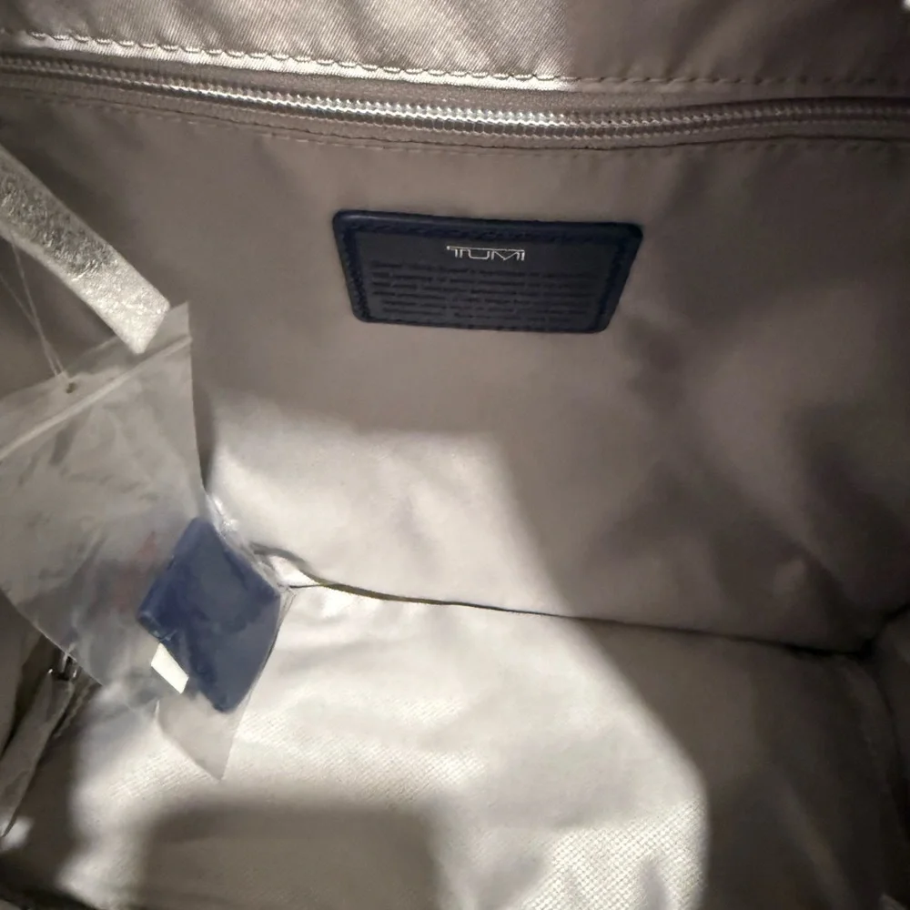 Tumi Baxley Navy Backpack with Silver Hardware Bottom compartment F 15” laptop